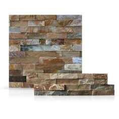 a stone wall with different colors and shapes