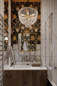 a bathroom with a chandelier hanging from the ceiling and a mirror on the wall