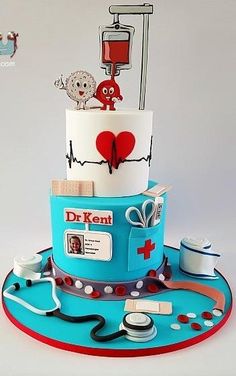 a blue cake with medical items on it