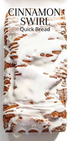 cinnamon swirl quick bread with white icing on top and the words, quick bread