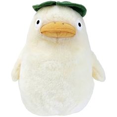 a white stuffed animal with a green hat on it's head and two eyes