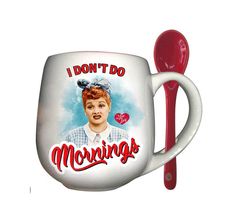 there is a coffee mug with a spoon next to it that says i don't do mornings