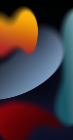 an image of abstract shapes with blurry colors in the back ground and on top of each other