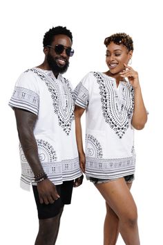 Available in Small, Medium, Large, XL, 2XL, 3XL, 4XL, 5XL, 6XL, 7XL Size-Inclusive: Available in a range of sizes to accommodate diverse body types, our dashiki promotes inclusivity and celebrates the beauty of all individuals within the Black diaspora. Big and Tall Sizes Available Light Weight Cotton: This makes it suitable for outdoor events, including festivals, concerts, Beaches, Cruises Versatile Fashion Statement: Whether worn for cultural events, festivals, or everyday wear, our dashiki a Casual White Top For Festival, Traditional Short Sleeve Tops With Graphic Print, Traditional Short Sleeve Graphic Print Top, White Cotton Tunic Shirt, White Tunic Tops For Festival, White Short Sleeve T-shirt For Festivals, Traditional White Top For Vacation, White Printed Tunic Top, Relaxed Fit Short Sleeve Tops For Festival