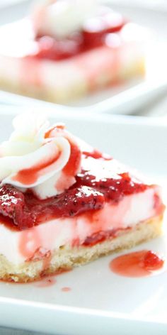 strawberry shortcakes with whipped cream and jelly topping on white plated serving platter