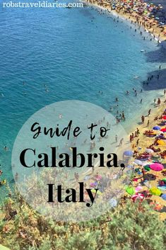 the beach with umbrellas and people on it, text reads guide to calabria italy