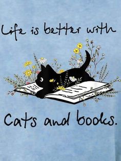 a cat laying on top of an open book with the words life is better with cats and books