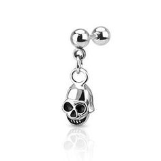 a silver charm with a skull hanging from it's side on a white background