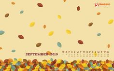 an image of a calendar with autumn leaves coming out of the top and below it