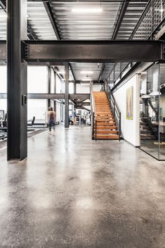 the inside of an office building with stairs