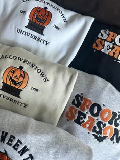 four halloween t - shirts with pumpkins on them and the words spooky season