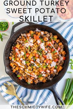 a skillet filled with food on top of a table