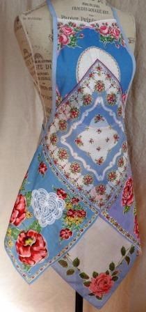 a mannequin with an apron on it's head and flowers on the front