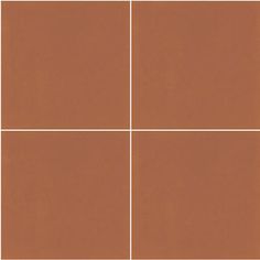 a brown tile wall with four squares in the middle and one square at the bottom