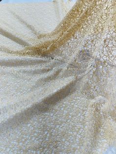 an image of a piece of cloth that looks like lace