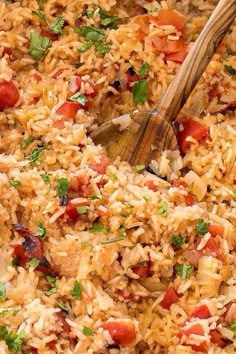 a large pot filled with rice and vegetables