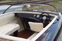 the interior of a speed boat is clean and ready to be used