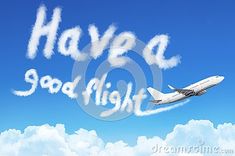 an airplane flying in the sky that says have a good flight