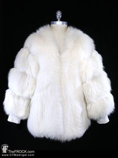 🎈ANNIVERSARY SALE TODAY We're having a Sale today here on Etsy, and also at our website TheFROCK.com (sale prices are good for new layaways too.)  Big fluffy vintage Pierre Cardin ivory fox fur and leather coat. Outer seam pockets, hook closure. The size, if shown on label, may not represent modern sizing, please go by measurements to ensure best fit. Measures bust 38", hem circumference 46", length 28", sleeve about 21.5". Condition is excellent.  Layaway is available. ALL DELIVERY DATES menti White Luxury Faux Fur Coat, Luxury White Faux Fur Coat, Luxury White Outerwear With Faux Fur Lining, Luxury White Fur Coat With Faux Fur Lining, White Fluffy Elegant Fur Coat, Elegant White Fluffy Fur Coat, Luxury White Fur Coat For Winter, Luxury White Winter Fur Coat, Winter Wedding Fur Coat With Faux Fur Trim