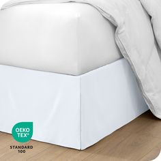 an image of a bed with white sheets