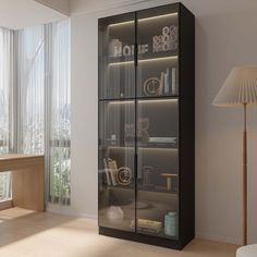 a room with a desk, chair and bookcase in it next to a window