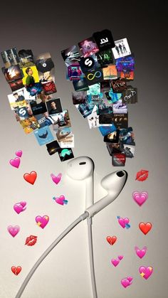 an apple earphones with hearts floating out of them