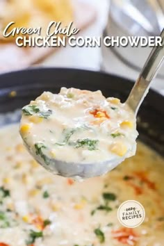 a ladle full of chicken corn chowder with the title text overlay reads green chile chicken corn chowder