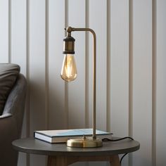 Elegant Antique Brass Table Lamp – Minimalist Exposed Bulb Design - Decor interiors Desk Lamp Office, Lamp Antique, Classic Lighting, Brass Table Lamp, Brass Table, Brass Table Lamps, Toggle Switch, Table Light, Desk Lamps