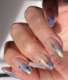 Whether you're a pro nail artist or a newbie, we're here to make your Christmas nails look stunning and nail-ready for the holiday season. Get inspired by these nail art! #nail #ideas Iridescent Star Nails, Astrology Themed Nails, Fall Witchy Nails, Starry Nail Designs, Hozier Nails, Solstice Nails, Dreamy Nail Art, Irridecent Design Nails, Virgo Nails Acrylic