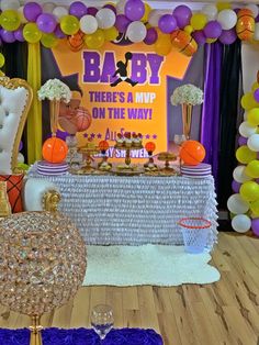 a baby shower party with balloons and decorations