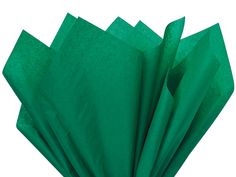 green tissue paper folded on top of each other