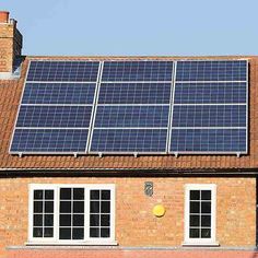 a house with solar panels on the roof