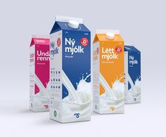 three cartons of milk on a white background