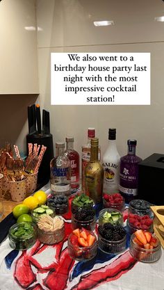 a table topped with lots of different types of food and drinks next to a sign that says, we also went to a birthday house party last night with the most impressive cocktail station