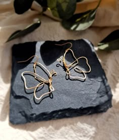 A beautiful pair of handmade butterfly earrings. Inspired by a line drawing, the abstract butterfly shape has been shaped by hand with gold plated wire and lightly hammered to add strength. They are hung from gold plated French hooks and measure approx 4cm long  Super lightweight and easy to wear They would make a lovely little gift All our orders are nestly giftwrapped and sent in eco-friendly packaging. A personalised note from the sender can be added to the order if you just let us know what your message is at the checkout    Visit us on Instagram www.instagram.com/lilbits.shop Gold Butterfly Earrings, Diy Earrings Easy, Abstract Butterfly, Butterfly Earrings Gold, Handmade Butterfly, Handmade Crystal Jewelry, Wire Jewelry Designs, Diy Wire Jewelry, Basic Tools