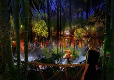 a woman standing in front of a forest filled with lots of trees and people at night