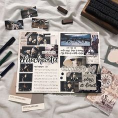 the contents of a scrapbook spread out on a bed