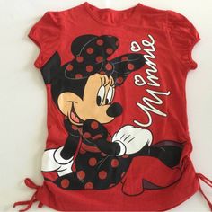 a red shirt with a minnie mouse on it