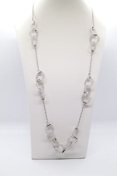 The Silver Sparkling Necklace is a beautiful piece of jewelry that will add a touch of glamour to any outfit. It's made of silver and has a delicate, sparkling design. The necklace is adjustable, so you can customize it to fit your neck perfectly. It's also available in other colors, so you can find the perfect match for your outfit.