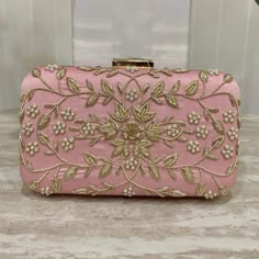 Introducing our designer Handmade clutches. With detailed intricate work, these purses are perfect for a daily wear as well as party wear. Comes with a detachable chain, you can easily switch from a hand purse to a crossbody. Spacious enough to fit daily essential needs as well as all kind of Phones. This gorgeous clutch in white with stone work is such an elegant piece. ALL SALES ARE FINAL. KINDLY MESSAGE ME FOR ANY INQUIRIES. Pink Bags For Evening And Festivals, Pink Rectangular Clutch For Events, Elegant Pink Clutch As Gift, Elegant Pink Clutch For Gift, Gold Evening Bag For Diwali, Chic Rectangular Evening Bag For Festive Occasions, Designer Pink Clutch For Party, Evening Clutch Bag For Diwali, Festive Clutch For Events