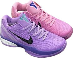 two purple and pink shoes with white soles on the bottom, one has a blue shoe