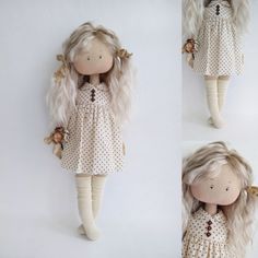 the doll has blonde hair and is wearing a white dress with polka dots on it