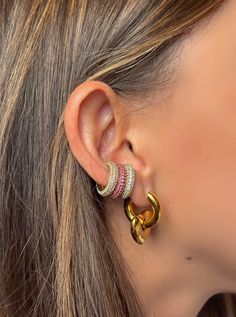 Introducing our exquisite waterproof Earcuff! This dazzling accessory is designed to impress with its vibrant range of multi-color options. The adjustable feature ensures a perfect fit for any ear size, while the pave detailing adds a touch of elegance. Stay stylish and confident, no matter the occasion, with our versatile and eye-catching Earcuff. * Made of thick 18K Gold plated. Hypoallergenic. * Sold individually or as a pair * Size: approximately 15mm diameter, 4mm thickness *  top grade 1mm Pink Single Ear Cuff, Gold Heart Earring, Earring Hoop, Heart Earring, Pink Purple Blue, Ear Cuff Earings, Wedding Jewelry Earrings, Jewelry Inspo, Reusable Bags