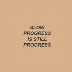 the words slow progress is still progress written in black on a beige background with an orange border