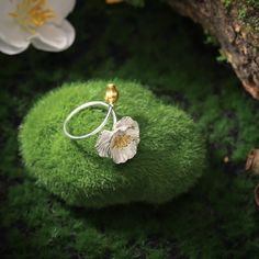 Showcase your love of nature with the timeless Poppy Ring. Delicately crafted in sterling silver, this exquisite piece is perfect for gifting someone special, or for adding a touch of sophistication to your everyday wardrobe. Allure with its effortless style and grace. DETAILS Plating: 18k Gold  Materials: 18k Gold on Silver Size: Adjustable Silver  Weight:  4.84g Poppy Ring, Love Of Nature, Unique Gift Wrapping, Cuban Link Chain Necklaces, Flower Engagement Ring, Opal Pendant Necklace, Someone Special, Anniversary Gift For Her, Style And Grace