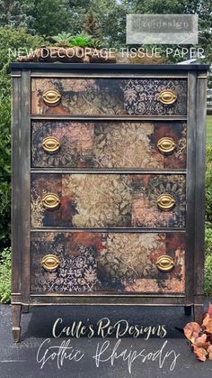 an old dresser has been painted with floral designs