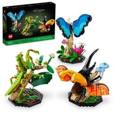 three legos are shown in front of a box with an image of plants and butterflies