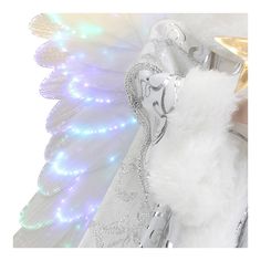 a white feathered costume with lights on it