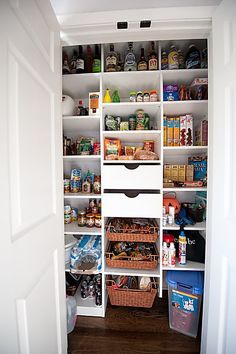 an open pantry with lots of food in it