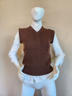 Good vintage condition  Marked size XL, fits like a modern ladies small, see measurements.  Measurements  Shoulders 15 Chest 34 unstretched  CB 21 brown Kentfield acrylic Brown Knit V-neck Vest, Fall Knitted Brown Sweater Vest, Fitted Brown Cotton Sweater Vest, Brown Fitted Cotton Sweater Vest, Fitted Knit Sweater Vest For Winter, Brown V-neck Sweater Vest For Winter, Fitted Fall Cable Knit V-neck Sweater, Casual Brown Knitted Sweater Vest, Brown V-neck Vest For Winter